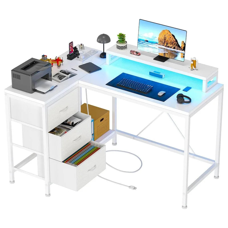 L-Shaped Gaming Desk - 7-Color LED Lights, 4 Power Outlets & 2 USB Ports, 3 Fabric Drawers, Removable Monitor Stand, Ergonomic