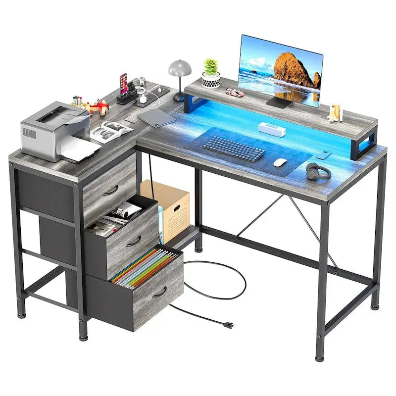 L-Shaped Gaming Desk - 7-Color LED Lights, 4 Power Outlets & 2 USB Ports, 3 Fabric Drawers, Removable Monitor Stand, Ergonomic