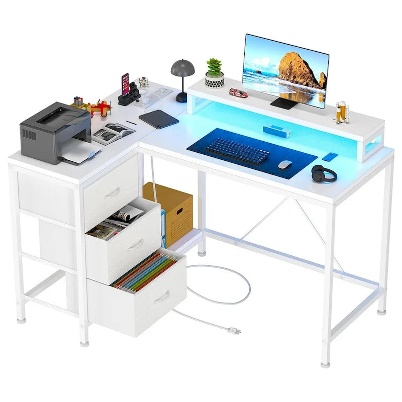 L-Shaped Gaming Desk - 7-Color LED Lights, 4 Power Outlets & 2 USB Ports, 3 Fabric Drawers, Removable Monitor Stand, Ergonomic